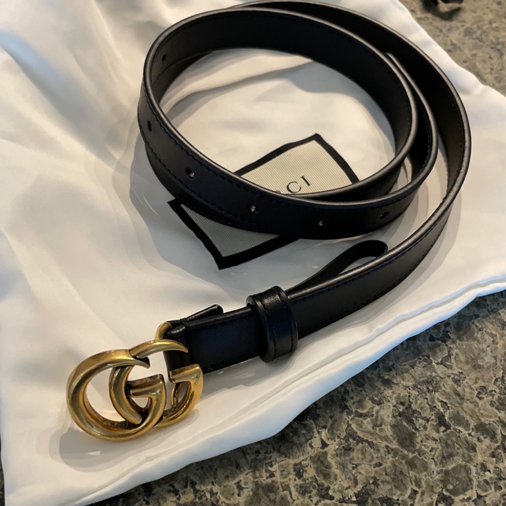 Gucci black belt.